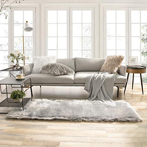 Ashler - Funda para sofá de piel de oveja sintética suave... - Maison & Cuisine Amazon Espagne à 53.90€